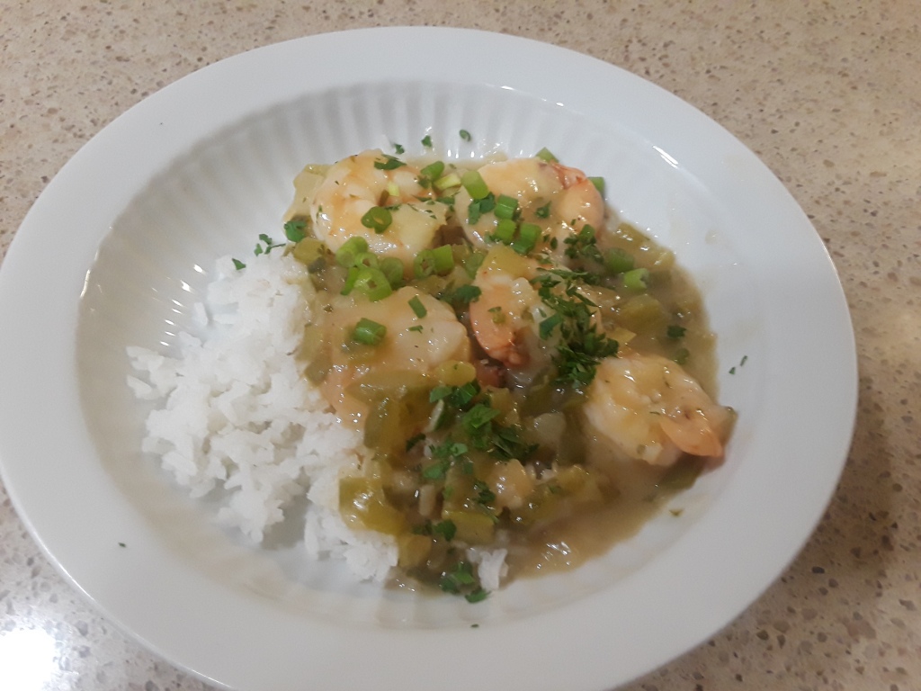 Photo of Shrimp étouffée with perfect steamed rice. Made by Leonide Martin.